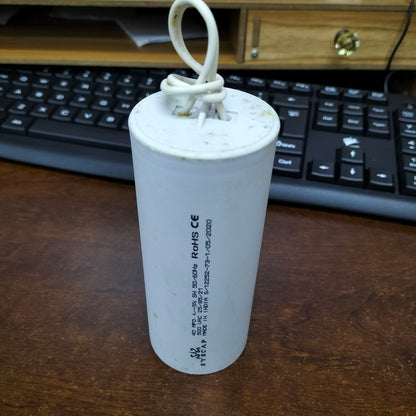SYSCAP motor running capacitor 40uF 500V with a white cylindrical body for reliable motor performance