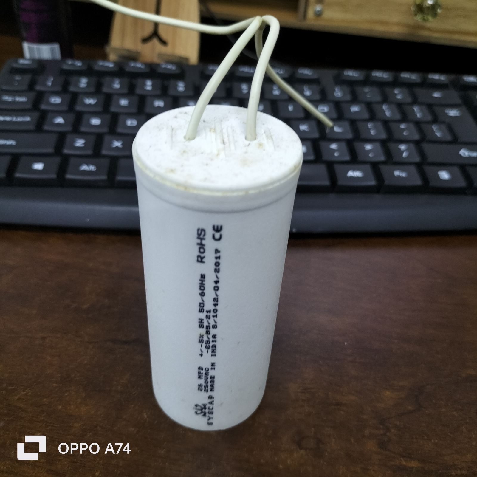 Syscap motor running capacitor white cylindrical electrical part with wires