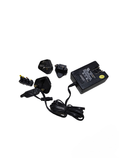 MW Switching Universal Power Supply with multiple plug adapters and a long black cable for versatile power connections