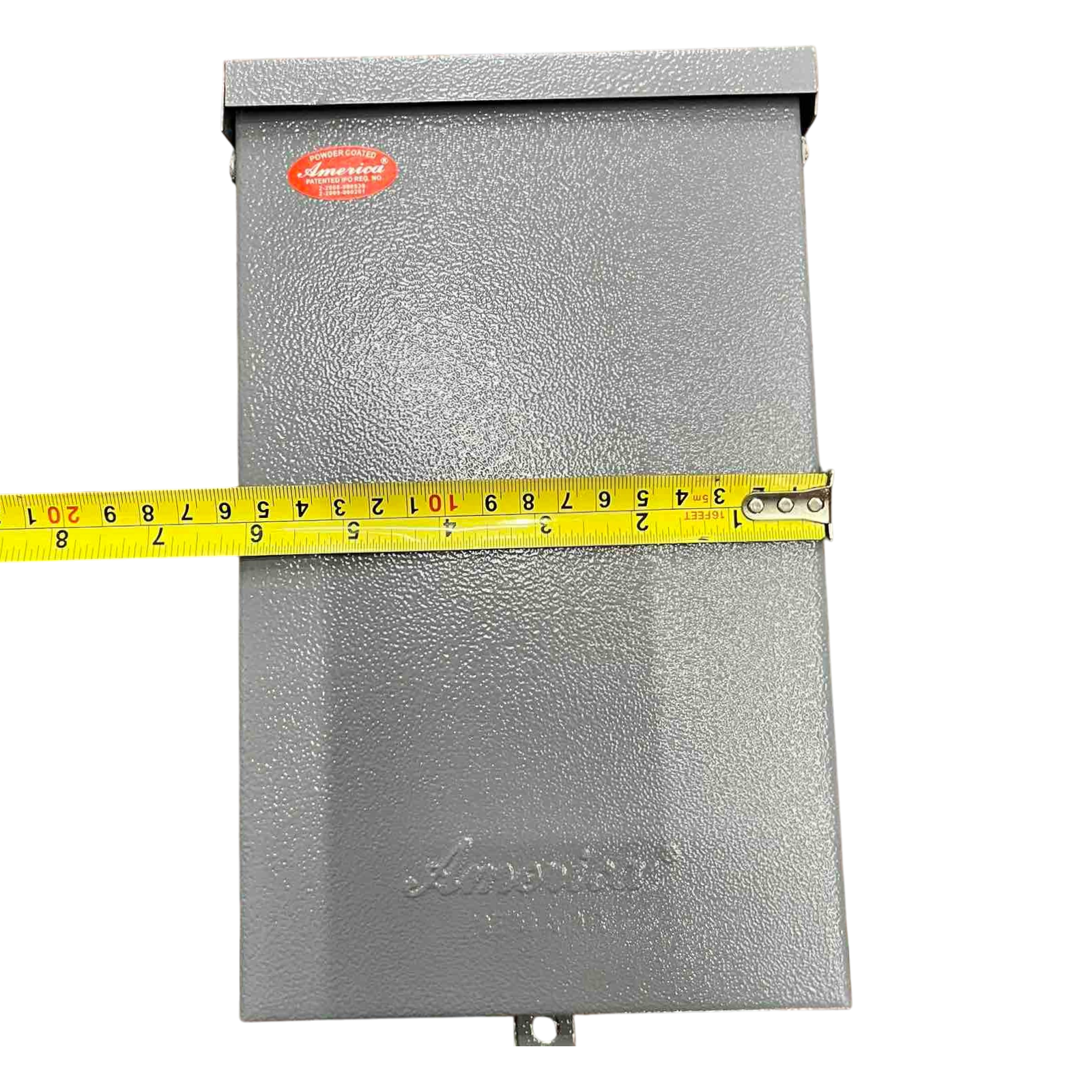 Nema 3R panel board housing in gray with measurement tape for size reference