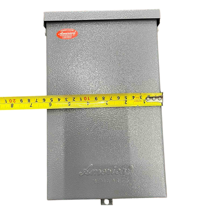 Nema 3R panel board housing in gray with measurement tape for size reference