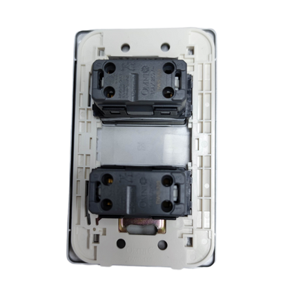 Omni 2 gang 3 way switch back view showing wiring terminals and mounting frame in white