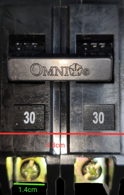 Omni 30A Circuit Breaker Plug-in Type electrical part with black casing and metal screws close-up