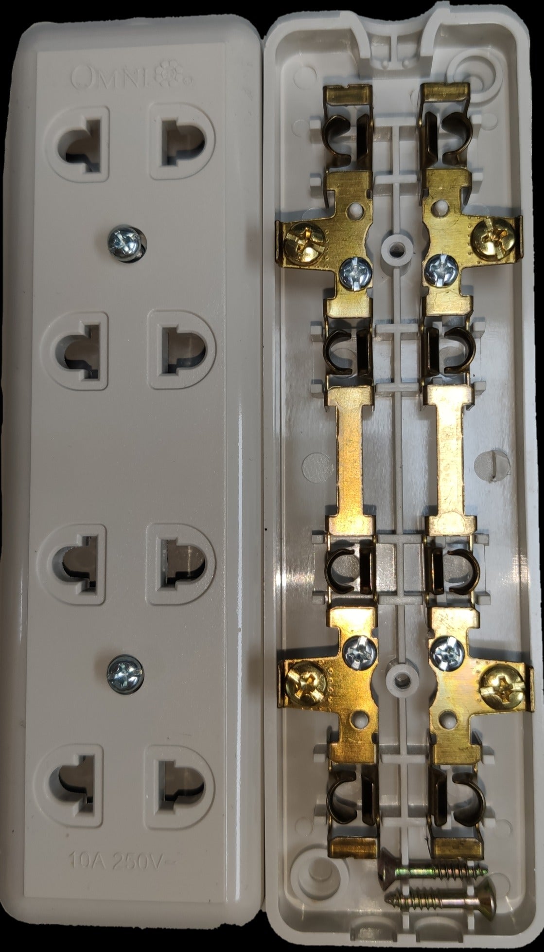 Omni 4 gang extension outlet showing front sockets and internal electrical circuitry parts