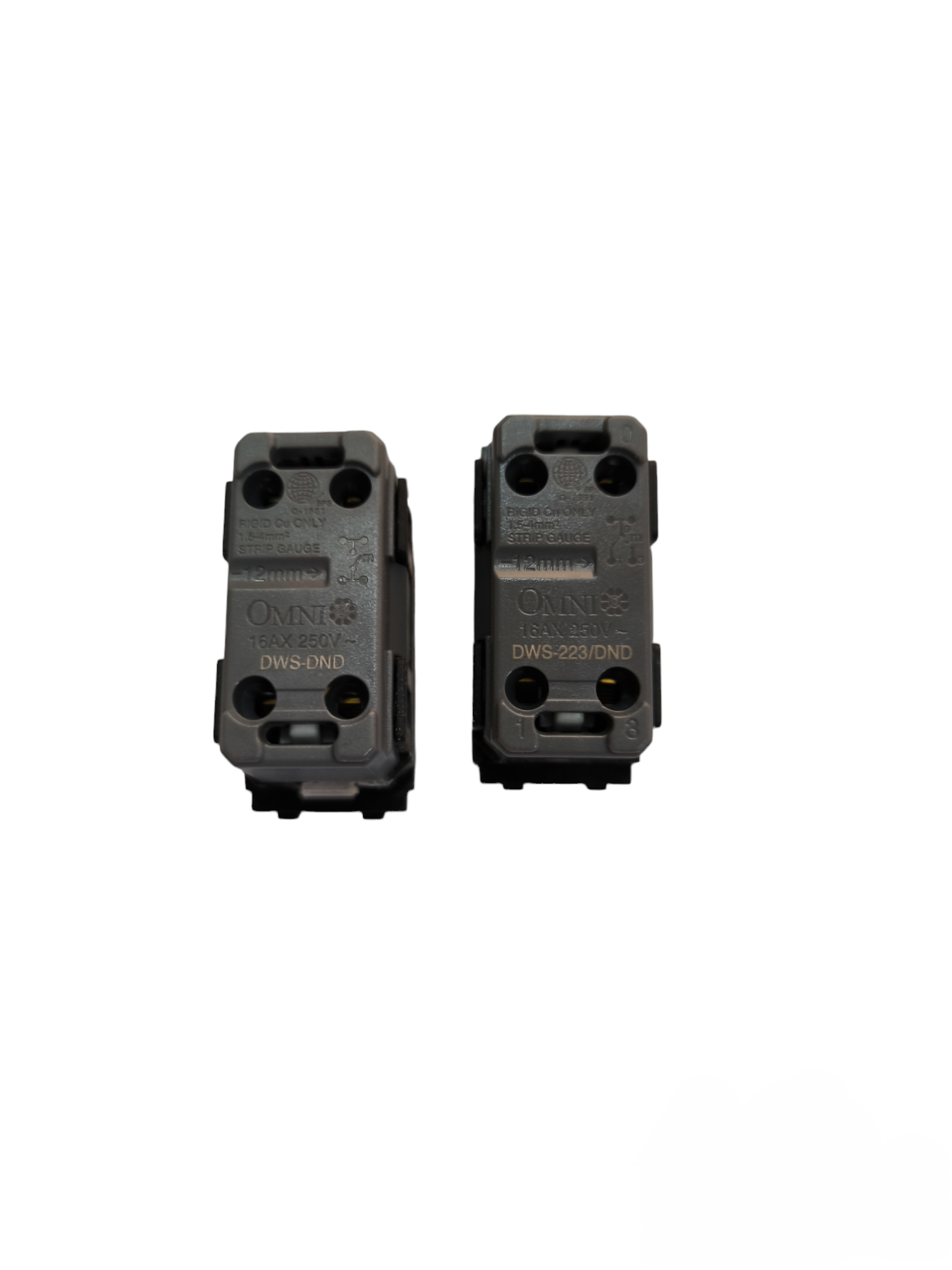 Black Omni power point switch components with multiple screw holes for electrical connections