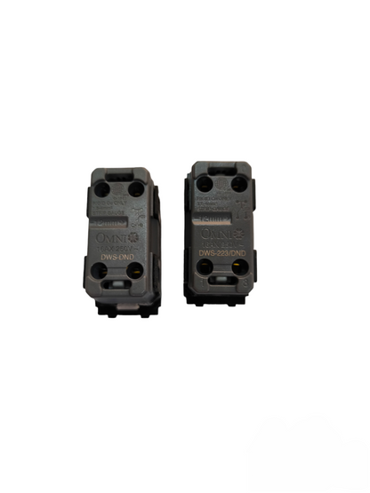 Black Omni power point switch components with multiple screw holes for electrical connections