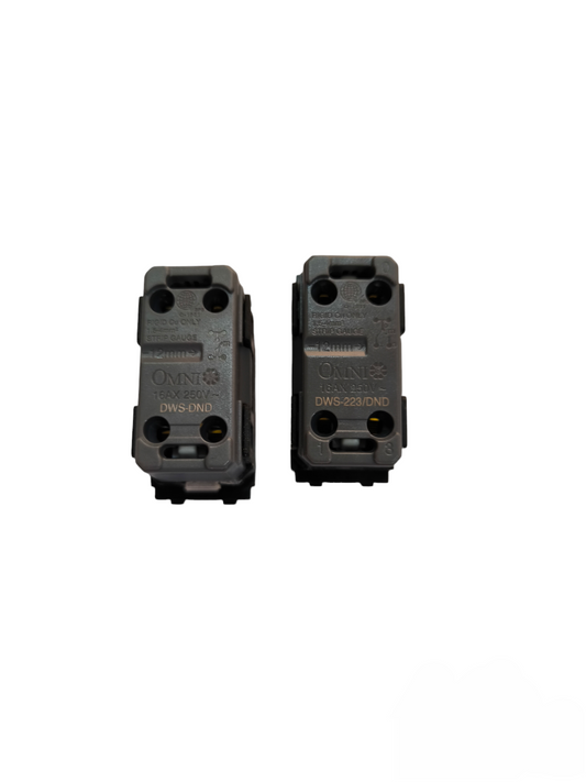 Black Omni power point switch components with multiple screw holes for electrical connections