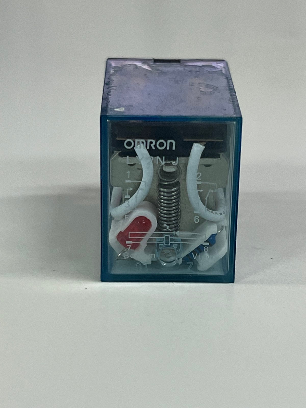 Omron LY2NJ relay 110V 8 Pins with clear housing and internal connections for reliable switching
