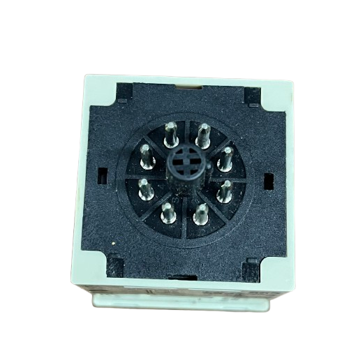 Omron multi range timer relay 8 pin top view showing circular 8 pin socket and white plastic housing