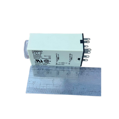 OMRON relay timer with front dial and visible pins on ruler Timer Relay 10 seconds 8 pins 110V