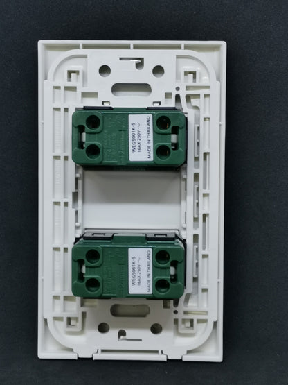 Panasonic 1 Way Switch 2 Gang Wide Series white rocker faceplate showing two green module inserts