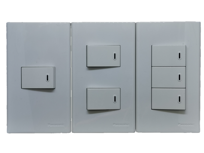 Panasonic 1 Way Switch 2 Gang Wide Series white wall plate trio showing single double and triple rocker switches