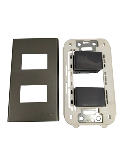 Panasonic 2 gang 4 way switch with black toggle switches and matching faceplate