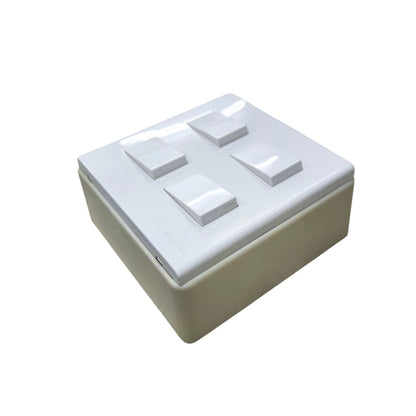 White Panasonic 4 gang switch with four rocker buttons in a square design for wall mounting