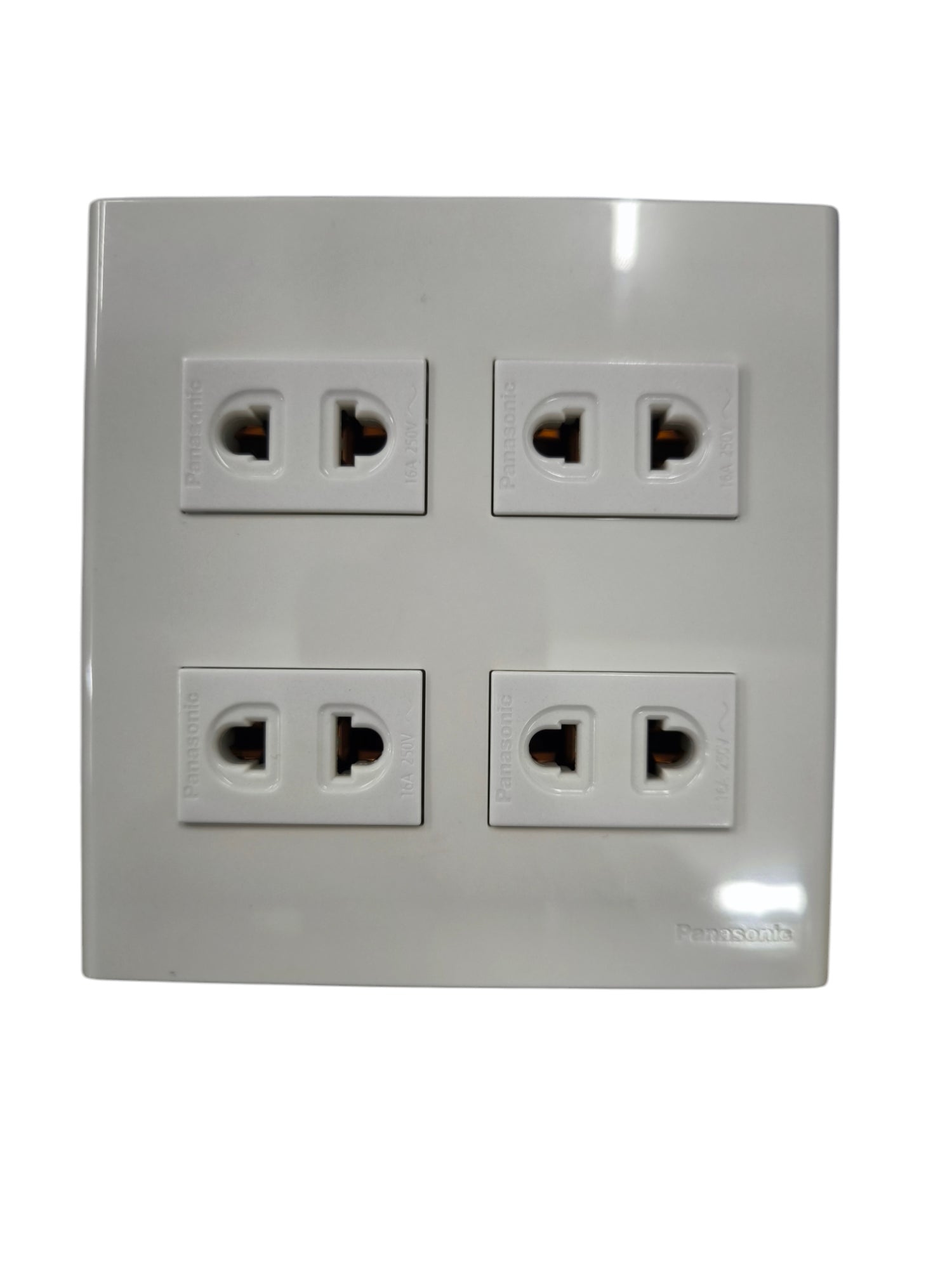 Panasonic 4 gang universal outlet with four universal power sockets in a white plastic frame