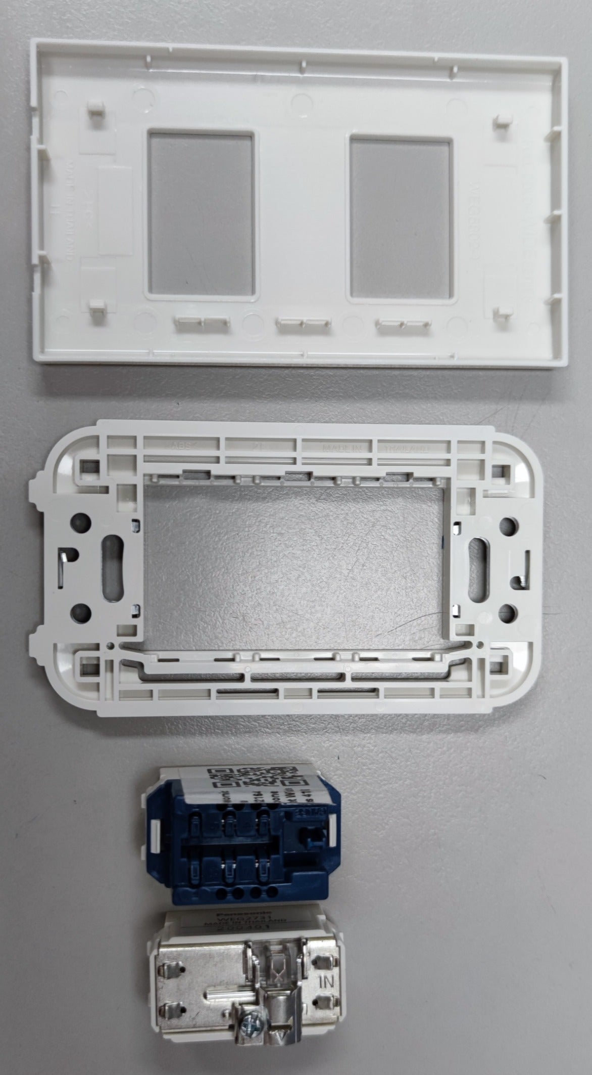 Panasonic Cable Outlet and Telephone Outlet components including white mounting frame and connectors
