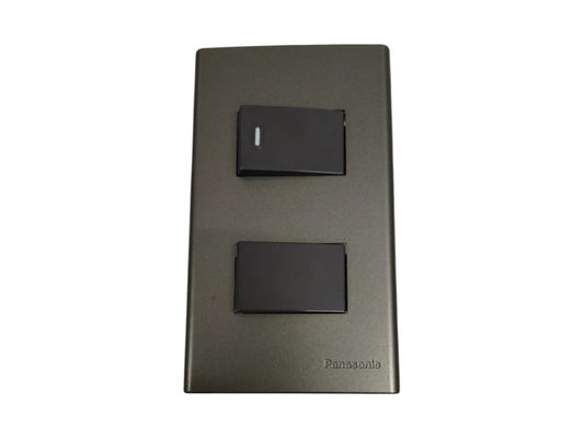 Panasonic combination 4 way 1 way switch 16A 250V in sleek black design with two switches on a gray plate