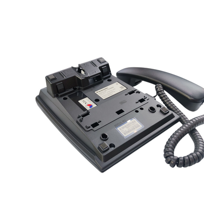 Back view of Panasonic KX-TS500MX black desk phone showing handset and cord details