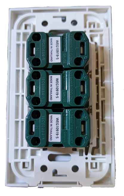 Panasonic 3 gang universal outlet internal modules with white mounting plate and green connectors