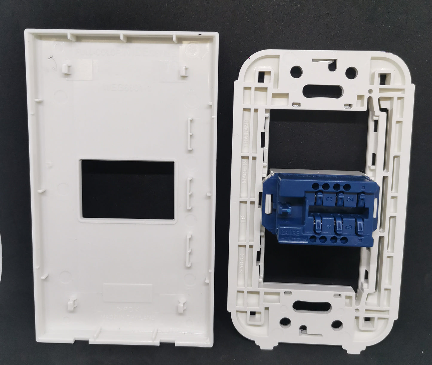 Panasonic Telephone Outlet Wide Series 1 Gang white faceplate with blue jack module for wall installation