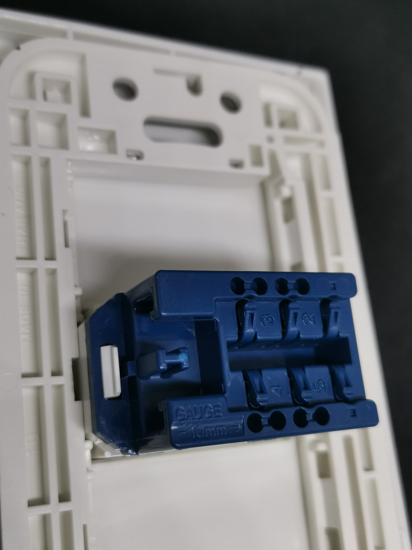 Panasonic Telephone Outlet Wide Series 1 Gang rear view showing blue modular jack mounted in white wall plate
