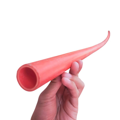 Hand holding a red 40mm PVC electrical conduit pipe by Atlanta against a white background
