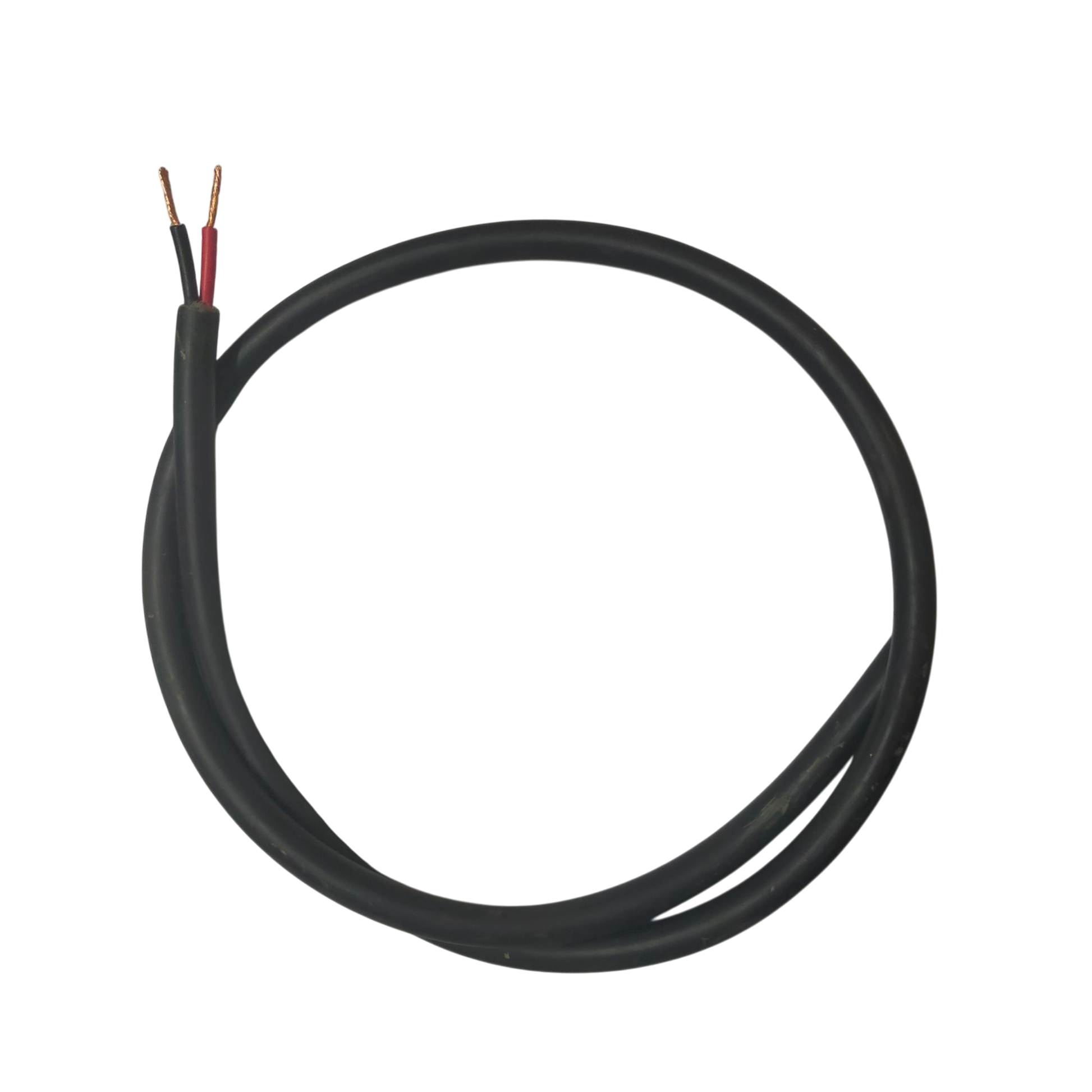 Phelps Dodge perma cord wire with black insulation and exposed copper ends on black background