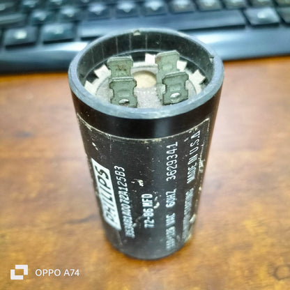 Philips Brand 72-86 MFD 110-125VAC electrical capacitor with black cylindrical body and metal terminals