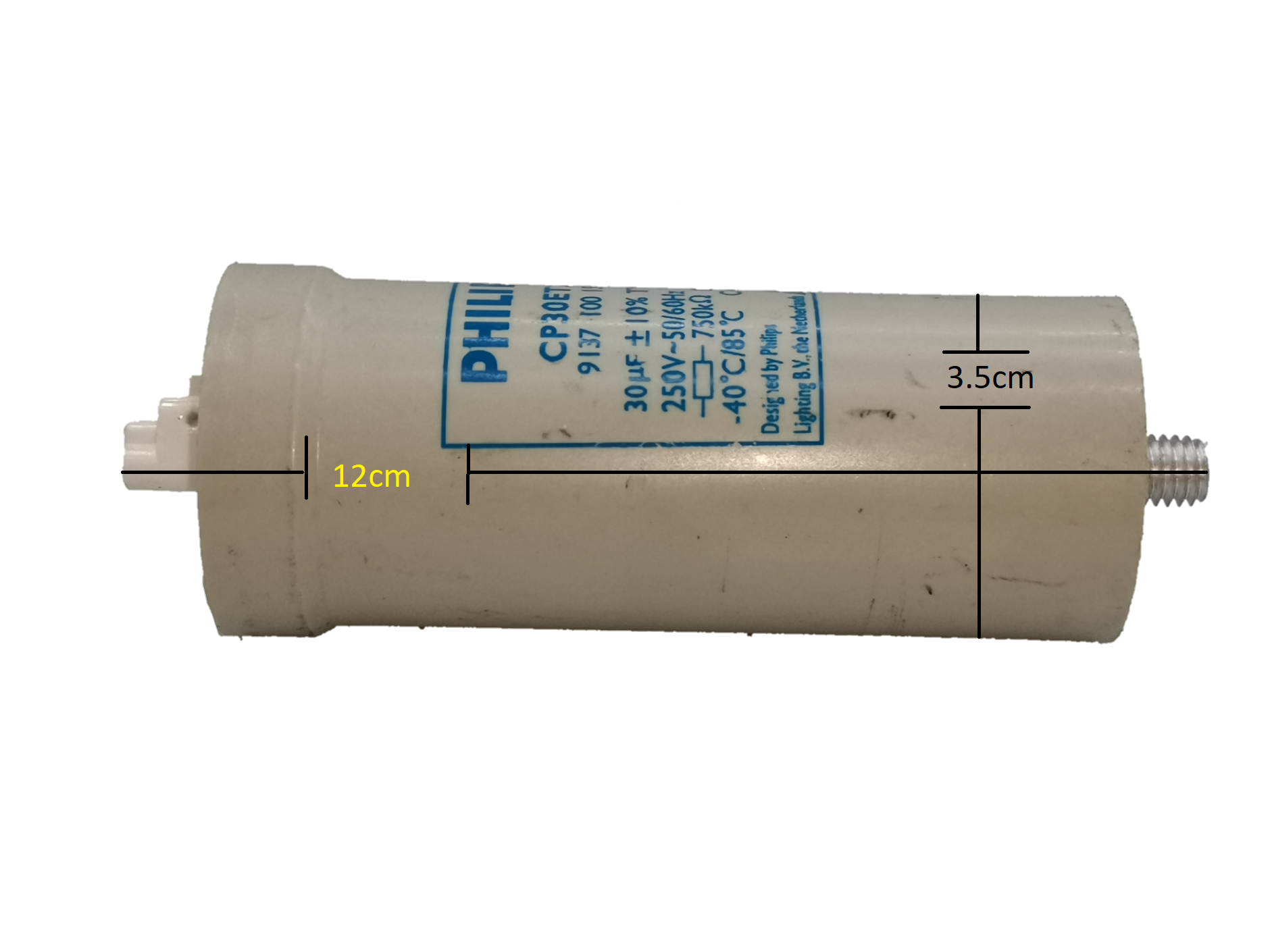 Philips Capacitor CP30ET28 30UF white cylindrical electrical component with size markings