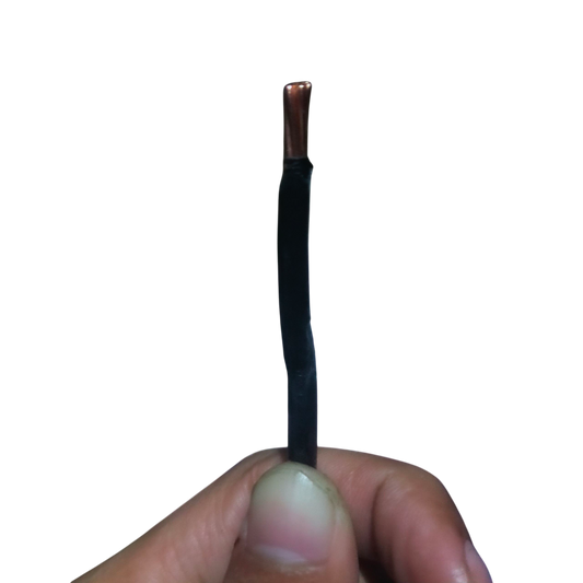 Philflex THHN wire 8.0 mm stranded with black insulation held between fingers against black background