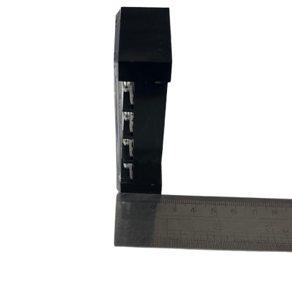Grippes 45A 4 Pairs Terminal Block 600V black plastic electrical connector with four metal terminals and ruler for scale