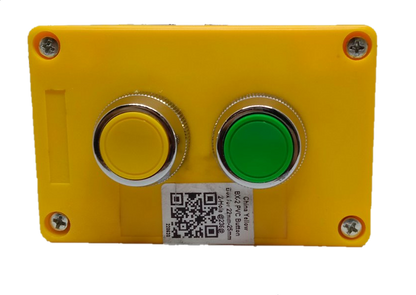 Electx push button switch in surface box with yellow casing and two buttons for easy operation