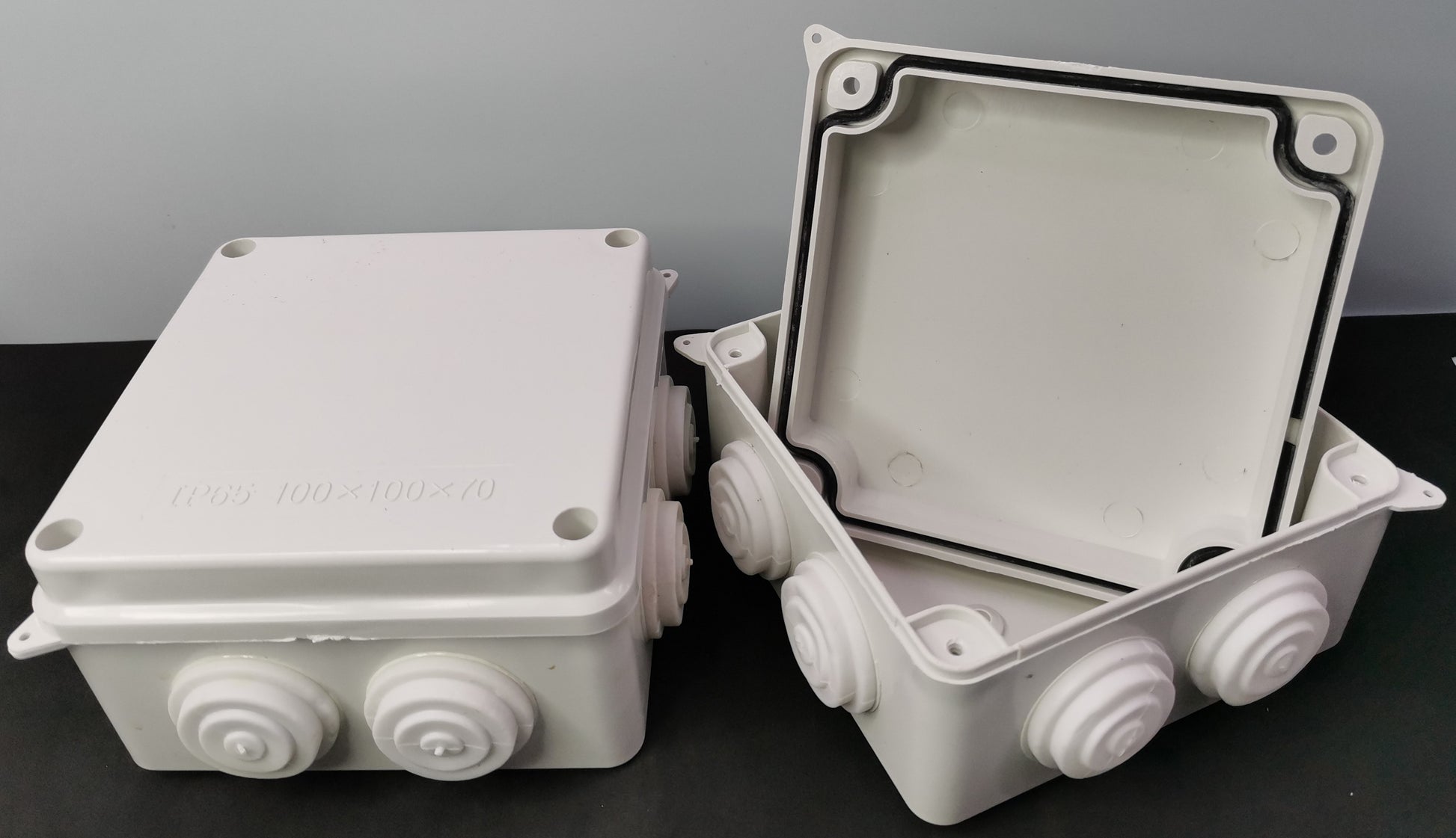 Grippes PVC Box 100x100x70 O Type electrical junction box with multiple conduit entry points in white
