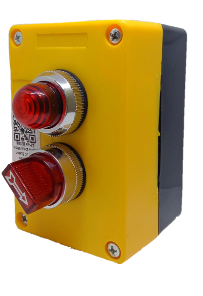 Auspicious red illuminated selector switch mounted on a yellow and black power control box