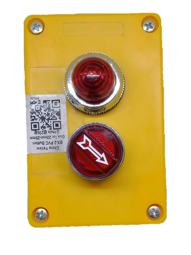 Auspicious red illuminated selector switch mounted on a yellow power points and switches panel