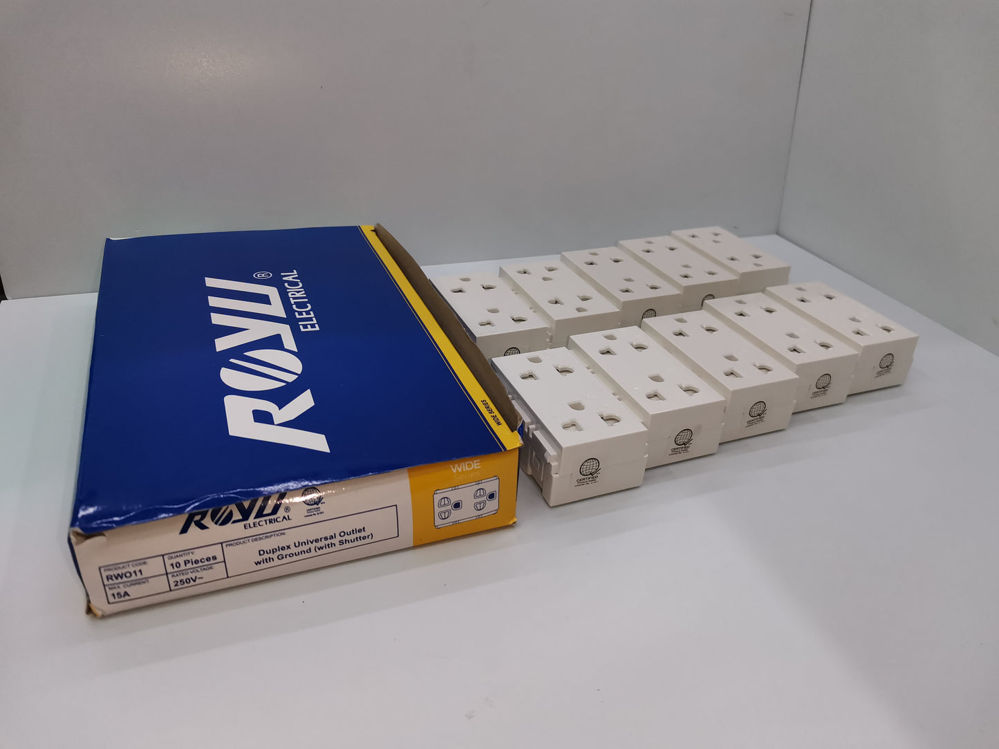 Royu Universal Outlet with Ground RWO11 white power points and packaging box shown in a set