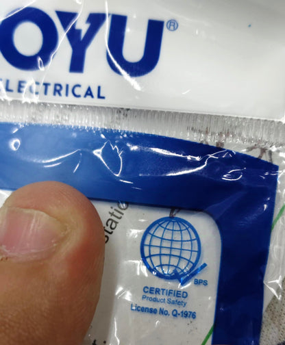 Close up of Royu 3 gang flat pin outlet packaging with brand logo and certified product safety label
