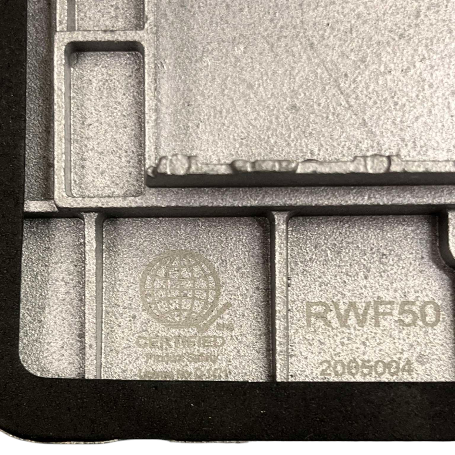 Close-up view of Royu Floor Outlet 4 Port USB Outlet metal casing with certification marking
