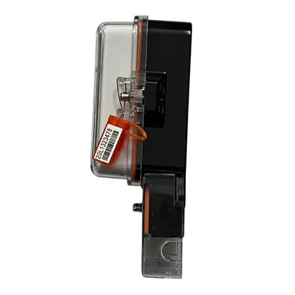 Side view of a single phase kwh electric meter with clear protective casing and barcode seal