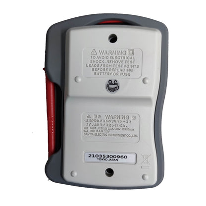 Sanwa analog pocket tester AP-33 500V AC with safety warnings for electrical testing