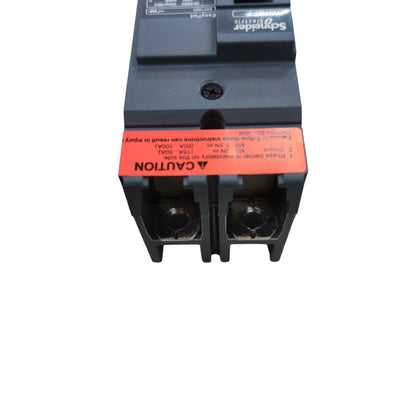 Schneider 75A Single Phase Industrial Type 25KAIC electrical circuit breaker with caution label
