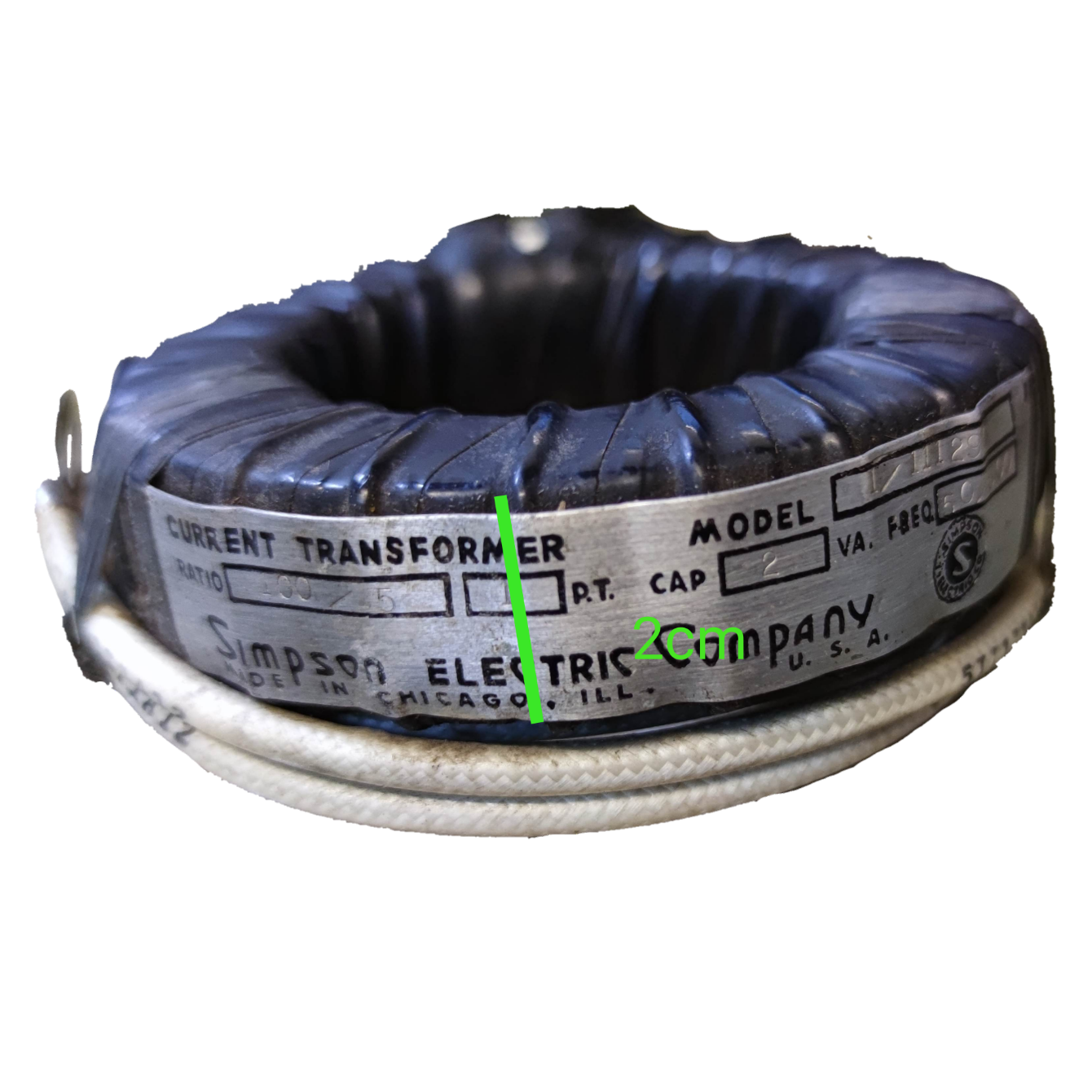 Simpson Single Core Current Transformer black ring style electrical component with white insulated wire