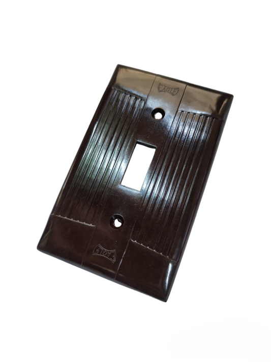 Eagle single gang device plate for outlets in black with a sleek design and ribbed texture