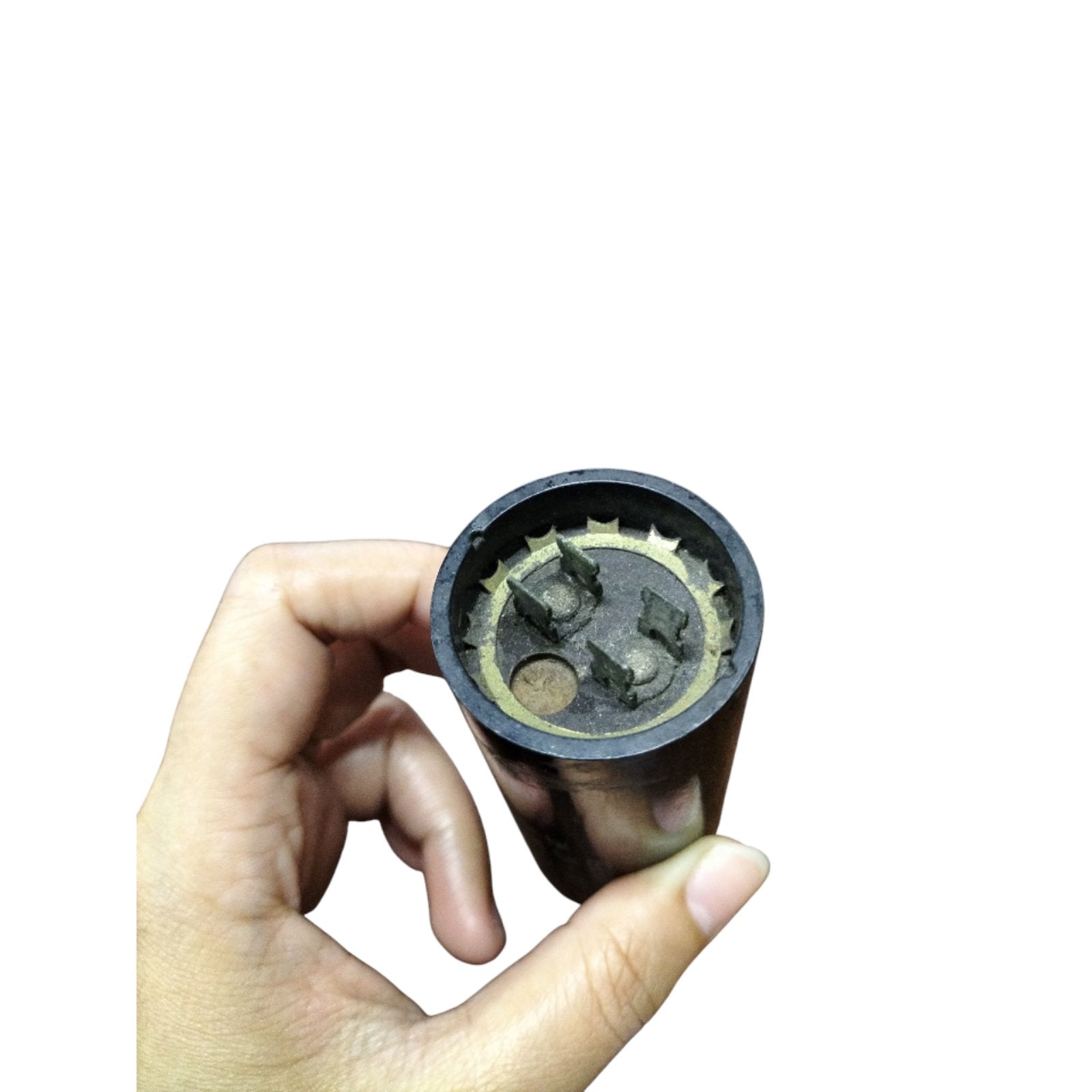 Hand holding a Motor Starting Capacitor 233-280UF from Philips & Sprague & Mallory showing internal connections