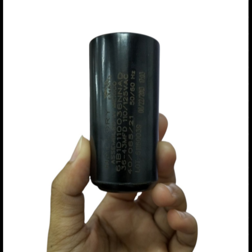 Mallory Starting Capacitor 36-43MFD 125V held in hand, designed for reliable electrical performance