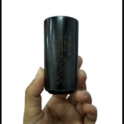 Mallory Starting Capacitor 36-43MFD 125V held in hand, designed for reliable electrical performance