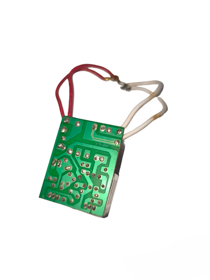 Step Down Transformer 220V to 12V electrical circuitry part with green circuit board and red white wires
