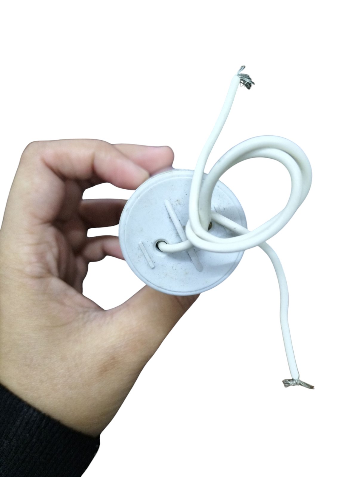 Syscap 14MFD 250 VAC Running Capacitor held in hand with connected wires