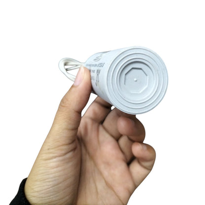 Syscap 15MFD 250V AC Running Capacitor held in hand for easy installation and connectivity.