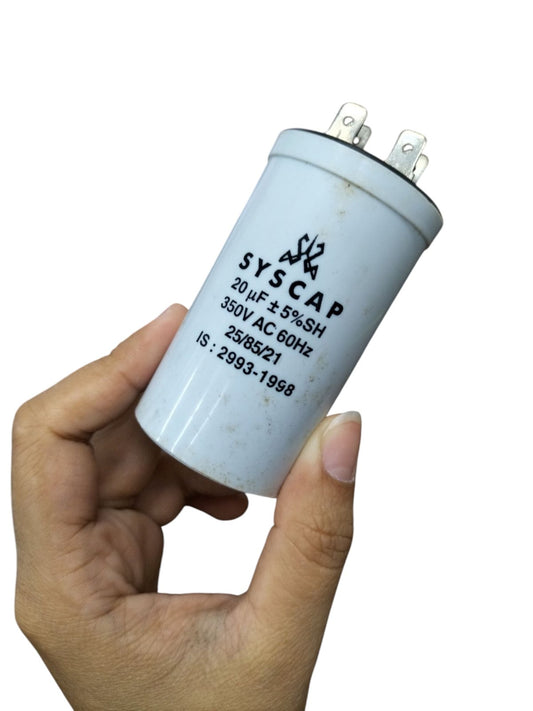 Syscap 20MFD 350 VAC Running Capacitor held in hand showing electrical circuitry part